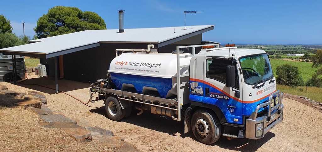 9,000 litre water trucks delivering to customers house.